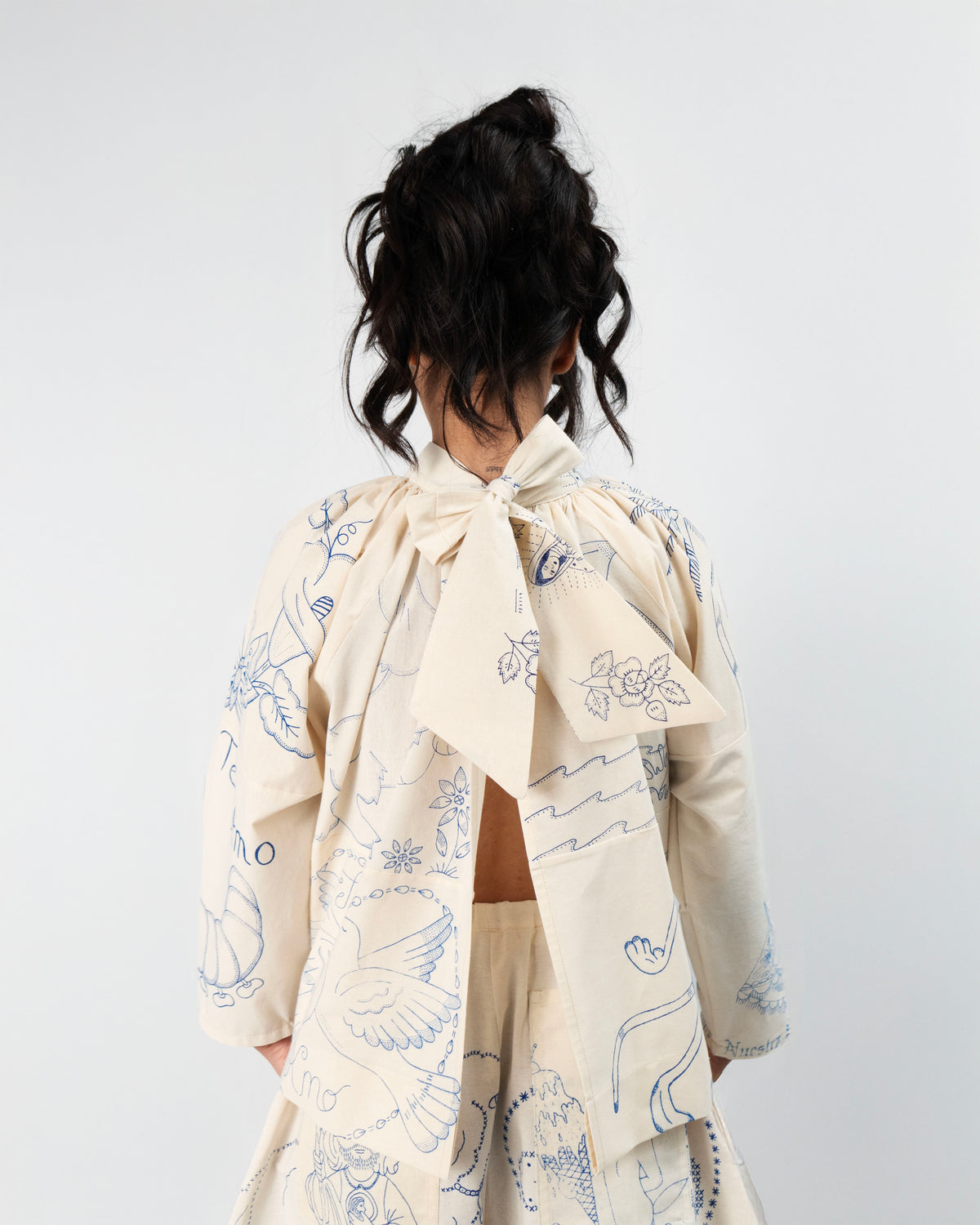LAZO OPEN-BACK BOW BLOUSE
